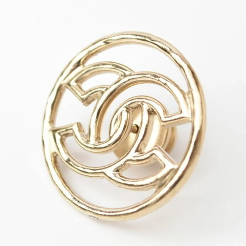 CHANEL Gold Logo Brooch